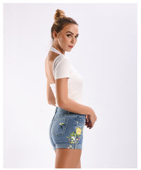 Shorts vaqueros con estampado de flores vintage