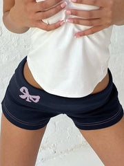 Pantalones cortos azul marino vintage con estampado de lazo y cintura vuelta