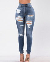 Vaqueros ajustados de cintura alta rotos y destruidos