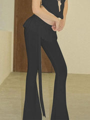 Pantalones acampanados con ribete de volantes vintage de color liso y cintura anudada