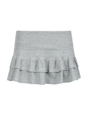 Minivestido con volantes, bordado con letras pequeñas y cintura baja con reborde