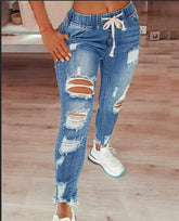 Vaqueros desgastados con cordón en la cintura Plus Extreme