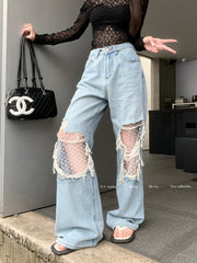 Mid Waisted Raw Hem Flared Bottom Jeans