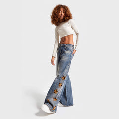 Embroidered high-waisted denim trousers