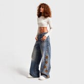 Embroidered high-waisted denim trousers