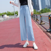 Himmelblaue Tencel-Jeans mit hoher Taille und weitem Bein und Taschen