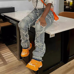 Layered ripped washed straight-leg fringe jeans