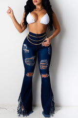 Vaqueros acampanados lavados con flecos rotos