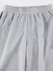 Pantalones deportivos grises vintage con pajarita de estilo urbano