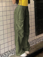 Pantalones cargo de tiro bajo con cremallera lateral y pop hip verde