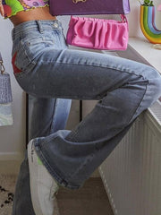 Schlagjeans mit Stern-Patch auf der Rückseite