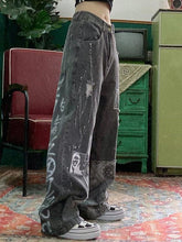 Vaqueros boyfriend con logo de cachemira patchwork