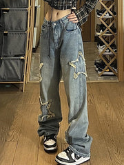 Vaqueros boyfriend vintage con efecto lavado y parche de estrellas