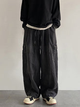 Vaqueros cargo holgados vintage negros para hombre con bolsillos de parche