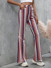 Pantalones vaqueros acampanados con dobladillo sin rematar y rayas multicolores