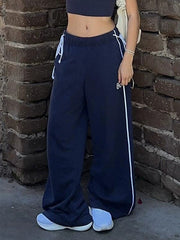 Pantalones deportivos vintage con cordón bordado y números