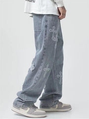 Vaqueros vintage azules para hombre con parche cruzado