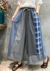 Lässige, elastische Karo-Jeans mit geteiltem Bund und neunter Jeans