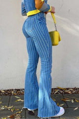 Vaqueros a rayas con dobladillo sin rematar