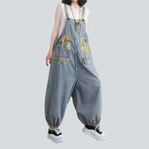 Baggy-Jumpsuit aus bemaltem Denim