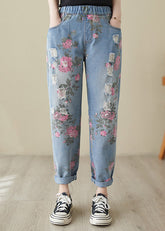 Hermosos pantalones harén de mezclilla de cintura alta con estampado azul