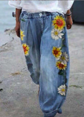 Übergroße Haremshose aus Denim im Bohemian-Stil mit Sonnenblumen-Print in Blau