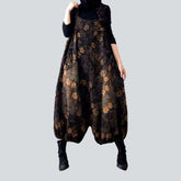 Jeans-Latzhose mit bronzefarbenem Blumenmuster