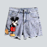 Jeansshorts mit Cartoon-Stickerei und Perlen