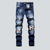 Patchwork-Bikerjeans mit Farbdruck