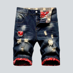 Dunkel gewaschene Distressed-Jeansshorts