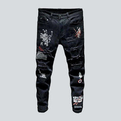 Destroyed painted men jeans