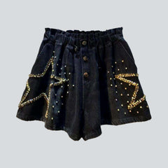 Shorts vaqueros adornados con estrellas de diamantes
