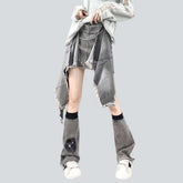 Grauer Jeansrock im Distressed-Patchwork-Stil
