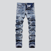 Distressed Patchwork-Jeans für Herren