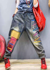 Pantalones harén de mezclilla con apliques de parche azul