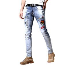 Vaqueros de hombre bordados en azul claro