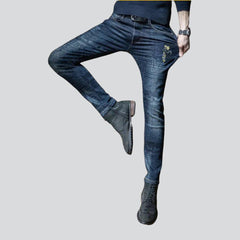 Vaqueros para hombre con estampado de inscripción de tigre