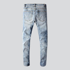 Vaqueros de hombre con adornos de cristales de estilo urbano