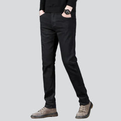 Vaqueros negros ajustados y elásticos para hombre