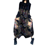 Mono vaquero con estampado de flores oscuras