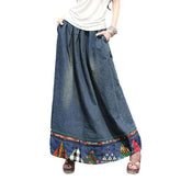 Langer Jeansrock mit besticktem Rand