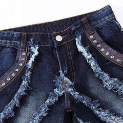 Vaqueros de hombre con bordado de cuero y remaches