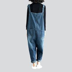 Jeans-Jumpsuit mit geflicktem Bein für Damen