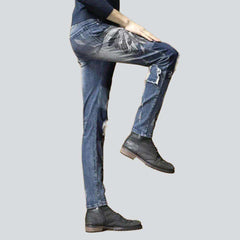 Vaqueros para hombre con bordado de calavera india