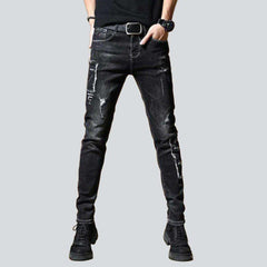 Bestickte, dehnbare schwarze Herrenjeans