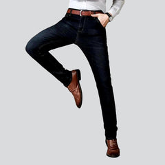 Vaqueros ligeramente desteñidos para hombre