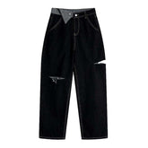 Vaqueros holgados negros con cortes para mujer