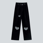 Schwarze Baggy-Jeans mit Herz-Malerei