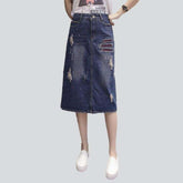 Knielanger zerrissener Jeansrock