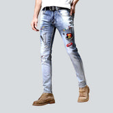 Hellblaue bestickte Herrenjeans